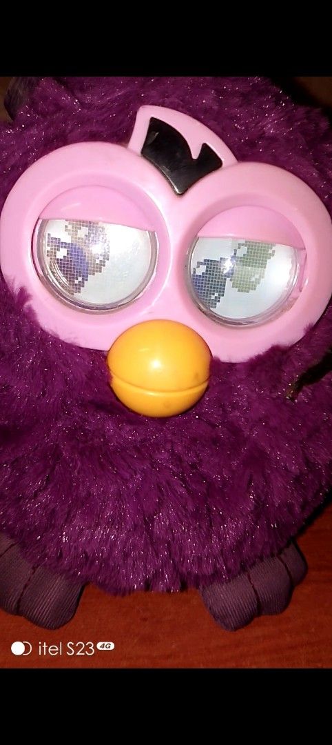 Hasbro Furby Plum Fairy (Category: Interactive Toys) located in Quezon City. Submitted by bees.kitty (Listing ID 1442166297, Image 3). Description: Hasbro Furby Plum Fairy P250 - preloved, working - missing ung 2 ears nya, may parang glue sa harap, pwede cguro gupitin, pero kayo na po bahala - sold as is, what you see is what you get - batteries NOT included - no PM, no transaction - first to pay.
