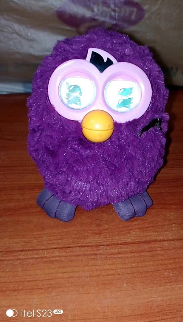 Hasbro Furby Plum Fairy (Category: Interactive Toys) located in Quezon City. Submitted by bees.kitty (Listing ID 1442166297, Image 2). Description: Hasbro Furby Plum Fairy P250 - preloved, working - missing ung 2 ears nya, may parang glue sa harap, pwede cguro gupitin, pero kayo na po bahala - sold as is, what you see is what you get - batteries NOT included - no PM, no transaction - first to pay.