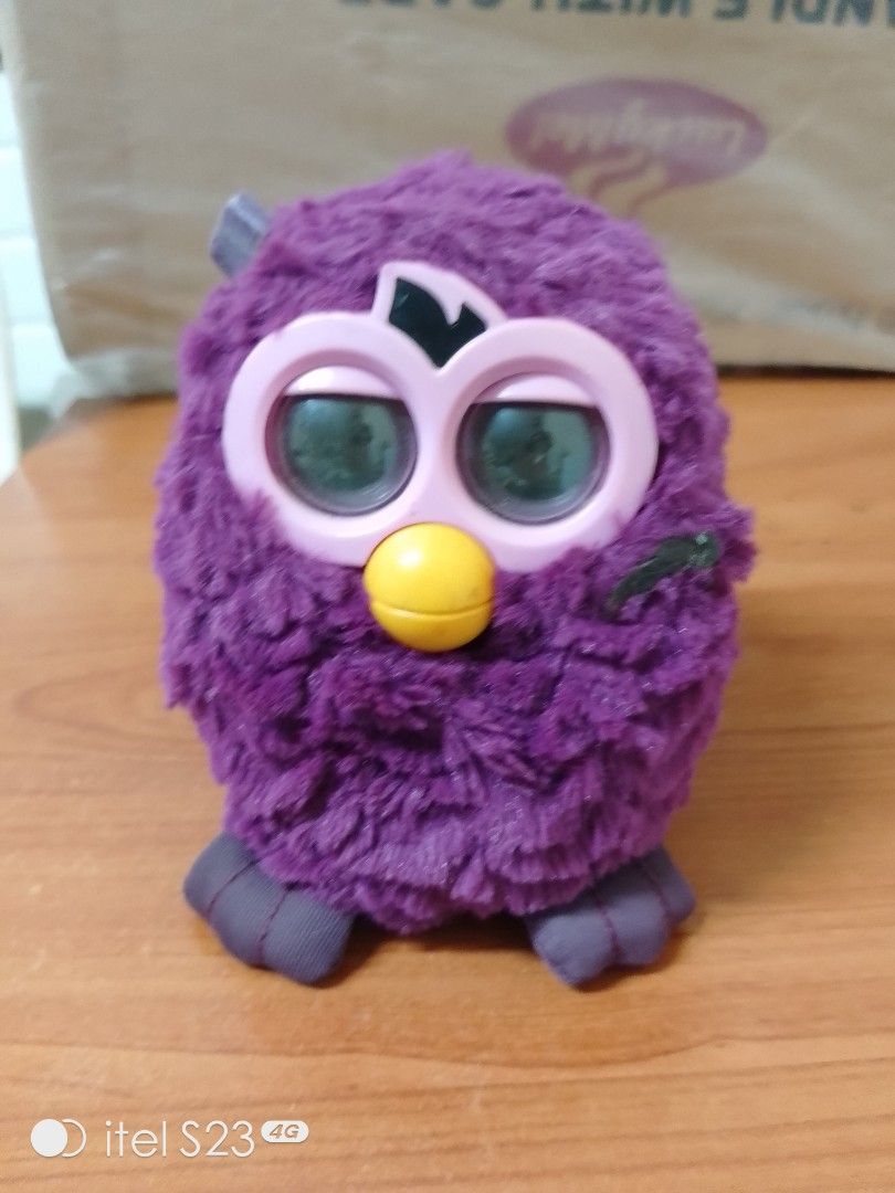 Hasbro Furby Plum Fairy (Category: Interactive Toys) located in Quezon City. Submitted by bees.kitty (Listing ID 1442166297, Image 1). Description: Hasbro Furby Plum Fairy P250 - preloved, working - missing ung 2 ears nya, may parang glue sa harap, pwede cguro gupitin, pero kayo na po bahala - sold as is, what you see is what you get - batteries NOT included - no PM, no transaction - first to pay.