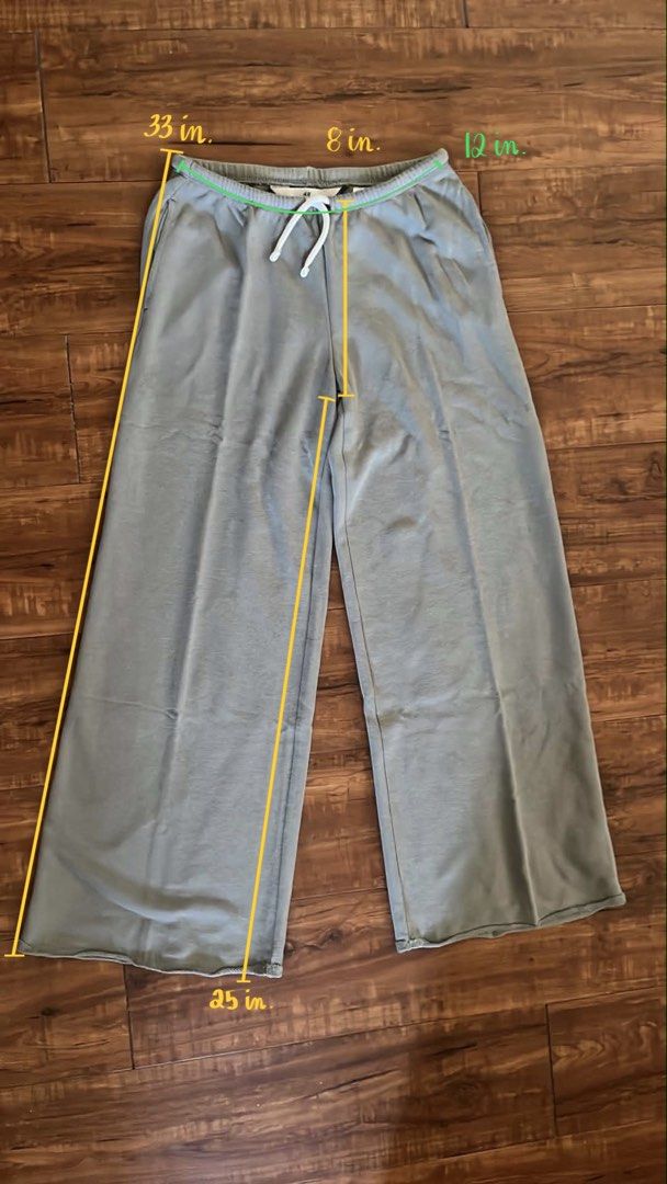 H&M Wide Leg Sweatpants Grey (Category: Other Bottoms) located in Cagayan de Oro. Submitted by gmaegp1020 (Listing ID 1442184676, Image 2). Description: - Brand: H&M - Style: Wide leg sweatpants - Color: Grey - Features: Elastic waistband with drawstring - Measurements: Waist 33 inches, Rise 12 inches, Inseam 25 inches.