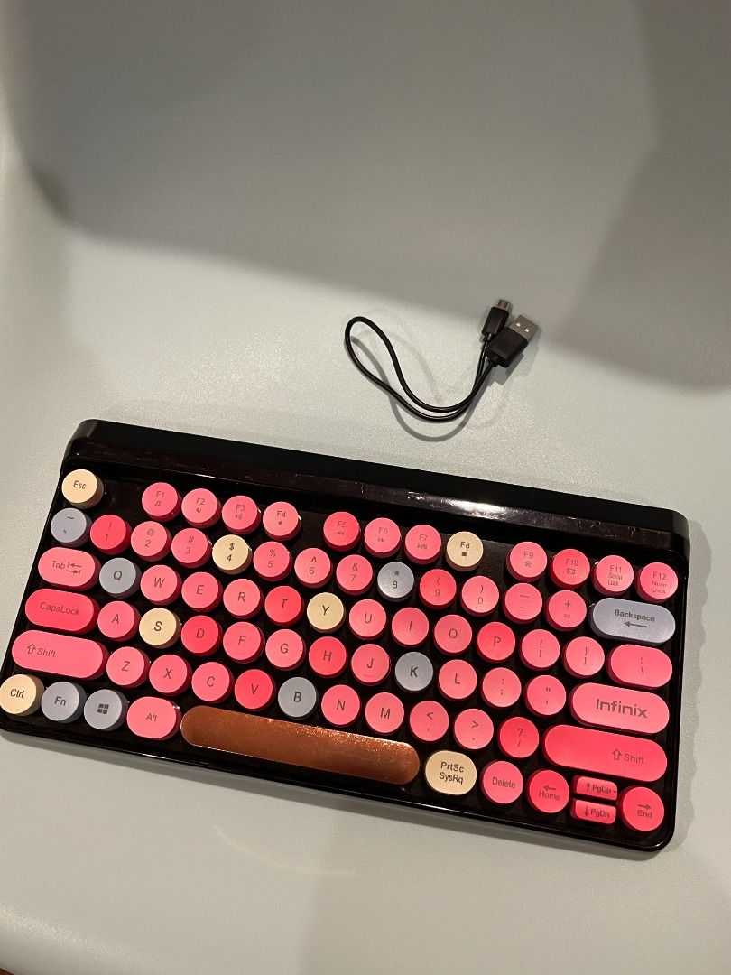 Infinix Wireless Retro Round Keycap Keyboard (Category: Computer Keyboard) located in Paranaque City. Submitted by declutteringtherapy (Listing ID 1442236772, Image 1). Description: - fully working, comes with charger - connected through bluetooth 💸 Payment through GCash or bank transfer 🚚 Delivery through Lalamove, Grab, or J&T.