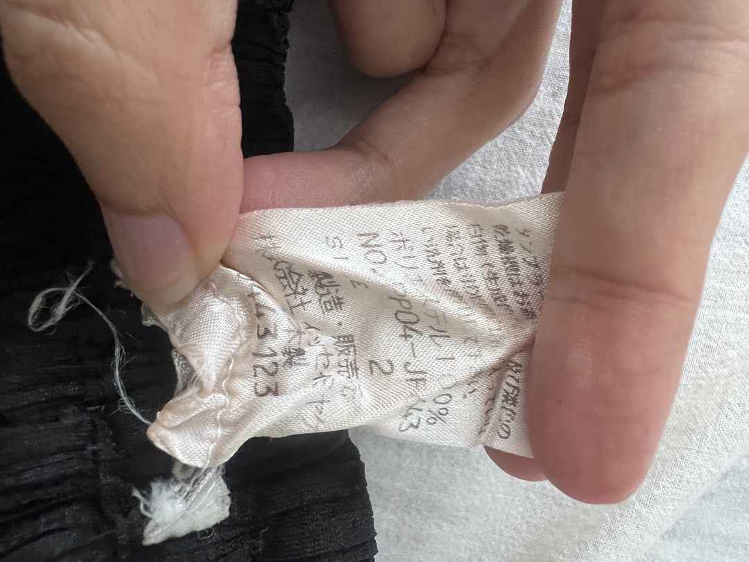 Issey Miyake Pleats Please Black Pants (Category: Other Bottoms) located in Manila. Submitted by okgreat (Listing ID 1442167558, Image 3). Description: Authentic Size 2 Length 37in Inseam 25in Waist 13in Leg opening 9.5in.