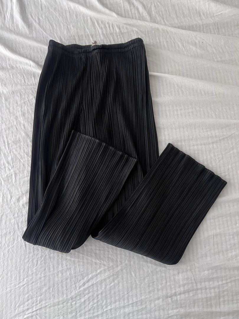 Issey Miyake Pleats Please Black Pants (Category: Other Bottoms) located in Manila. Submitted by okgreat (Listing ID 1442167558, Image 1). Description: Authentic Size 2 Length 37in Inseam 25in Waist 13in Leg opening 9.5in.