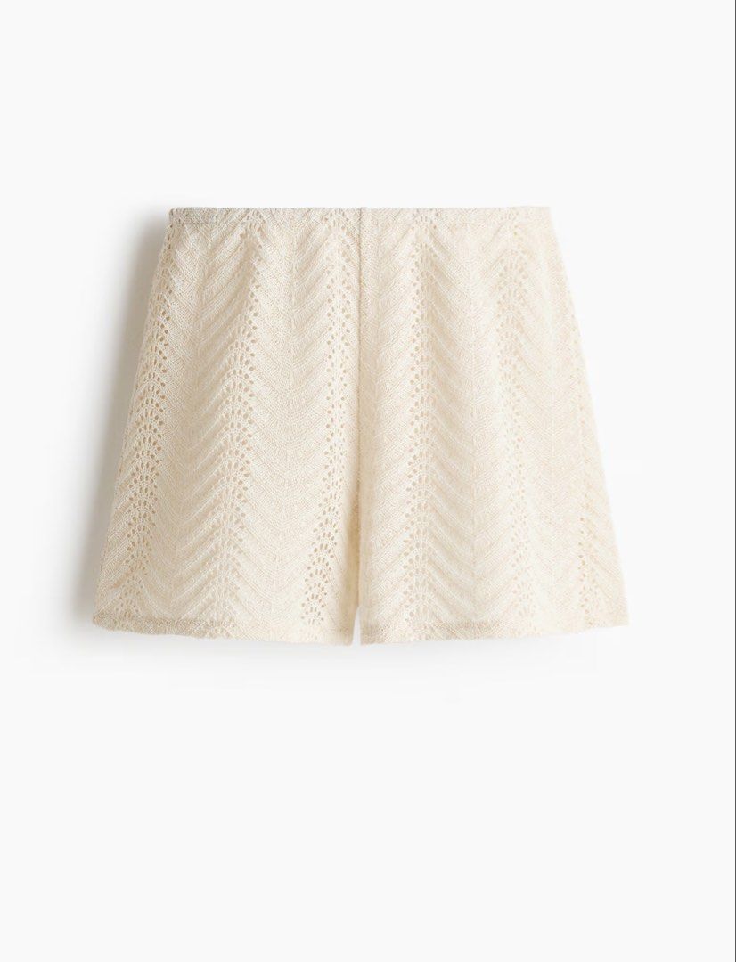 Knit coords (set) (Category: Sets or Coordinates) located in Manila. Submitted by paperthread (Listing ID 1442318816, Image 3). Description: - Super cute cream crochet knit set - Features a polo collar top - Includes matching shorts - Ideal for beach days or lounging - Lightweight and breathable material - Versatile: wear together or separately.