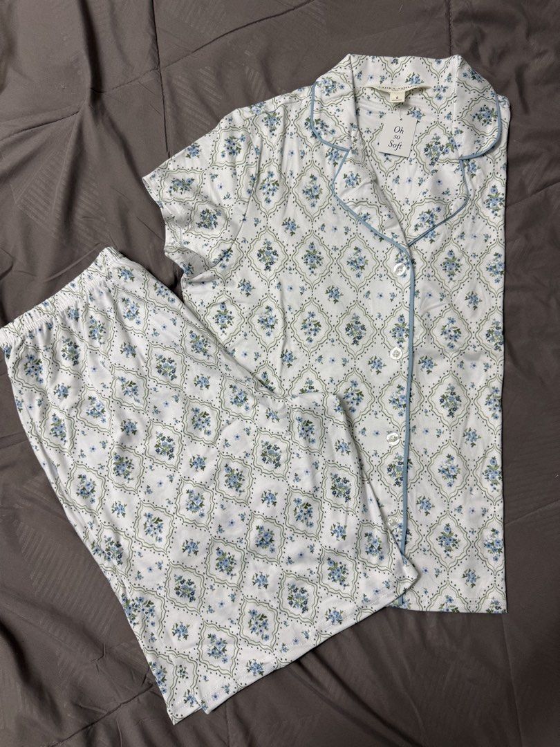 Laura Ashley Blue Floral Pajama Set Size S (Category: New Undergarments & Loungewear) located in Selayang. Submitted by prelovebyft (Listing ID 1442297466, Image 2). Description: - Laura Ashley pajama set - Size: S - Includes: Button-down top with chest pocket and short pants - Material: Soft and comfortable 72% Polyester 27% Rayon 1% Spandex - Condition: New with tags - Perfect for a cozy night’s sleep - S size fits 60kg below.