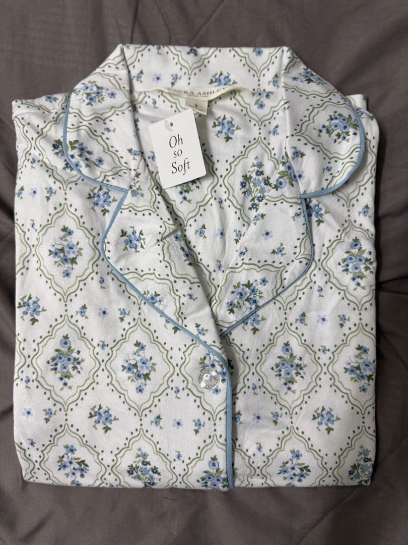 Laura Ashley Blue Floral Pajama Set Size S (Category: New Undergarments & Loungewear) located in Selayang. Submitted by prelovebyft (Listing ID 1442297466, Image 1). Description: - Laura Ashley pajama set - Size: S - Includes: Button-down top with chest pocket and short pants - Material: Soft and comfortable 72% Polyester 27% Rayon 1% Spandex - Condition: New with tags - Perfect for a cozy night’s sleep - S size fits 60kg below.