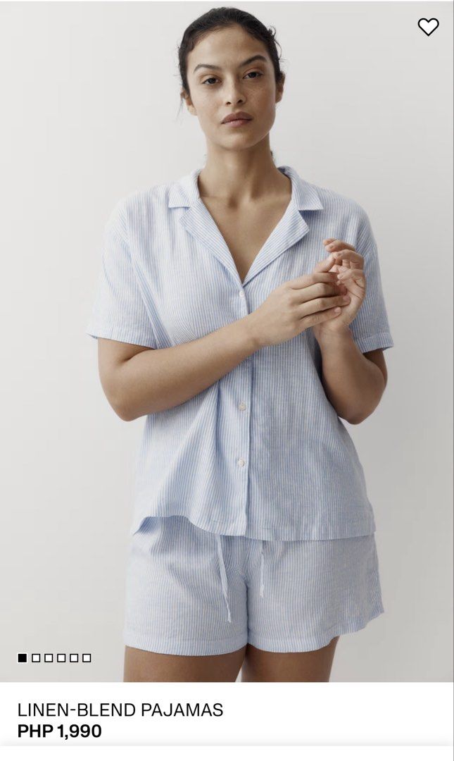 Linen-Blend Striped Pajama Set (Category: Undergarments & Loungewear) located in Manila. Submitted by paperthread (Listing ID 1442230986, Image 2). Description: - Light blue and white striped pajama set - Short-sleeved button-up top with collar - Matching shorts with drawstring waist - Made from a comfortable linen blend - Ideal for lounging at home - Original price: PHP 1,990.
