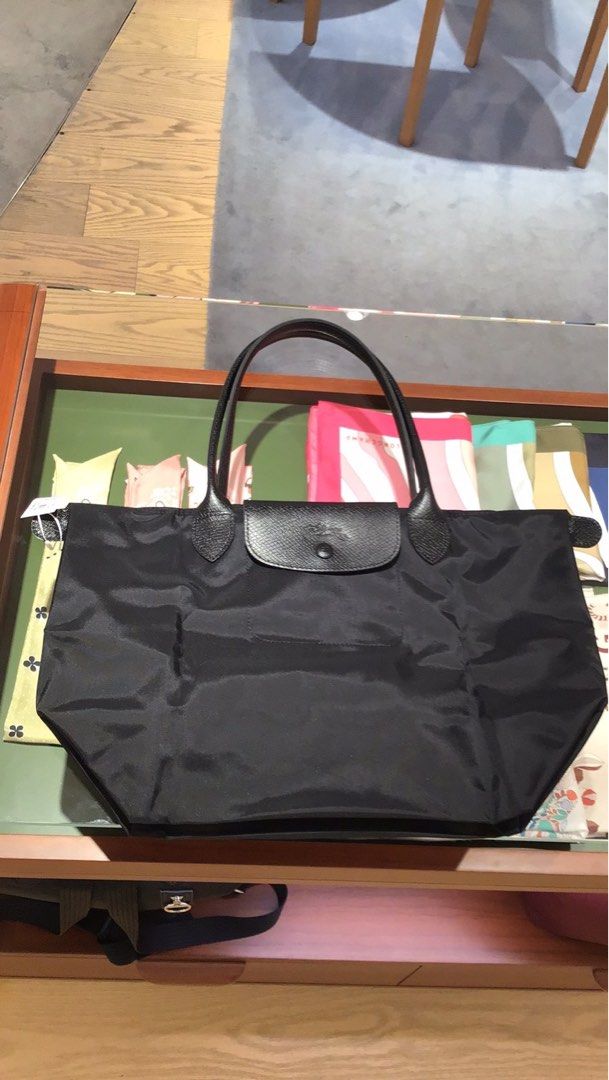 Longchamp Le pliage One Onhand (Category: Luxury Bags & Wallets) located in Pasay City. Submitted by theluxefinds.phonhand (Listing ID 1442202168, Image 3). Description: Original Longchamp Le pliage One ( monochromatic colors With proof of purchase 1 per color only .