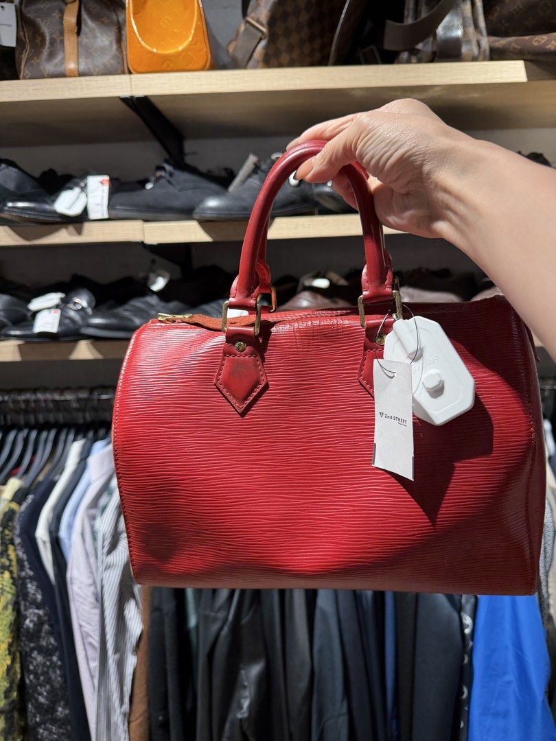 Louis Vuitton Epi Speedy Red Handbag (Category: Luxury Bags & Wallets) located in Manila. Submitted by jodiluxegold (Listing ID 1442243774, Image 2). Description: - Authentic Louis Vuitton Speedy Bag - Classic Red Epi Leather - Top Handles - Zipper Closure - Small Side Pocket - Comes with Original Tags - Ideal for Daily Use.