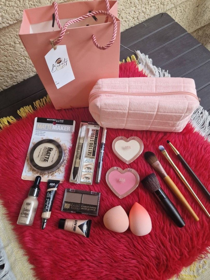 Make Up Set w/ Brushes & Pouch (Category: Makeup) located in Quezon City. Submitted by floreskari78555 (Listing ID 1442269885, Image 1). Description: Make Up Set with Brushes & Pouch✨️ Set includes; Make up❤️💋 Maybelline Mattifying Powder (10 Classic Ivory) Maybelline Tattoo Studio Brow Lift Stick (264 Clear) Maybelline Brow Natural Duo 2 in Pencil (Brown) Malibu Glitz Eyebrow Powder Dark Brown Aoa Perfect Natural Finish Concealer L3 Aoa Satin D