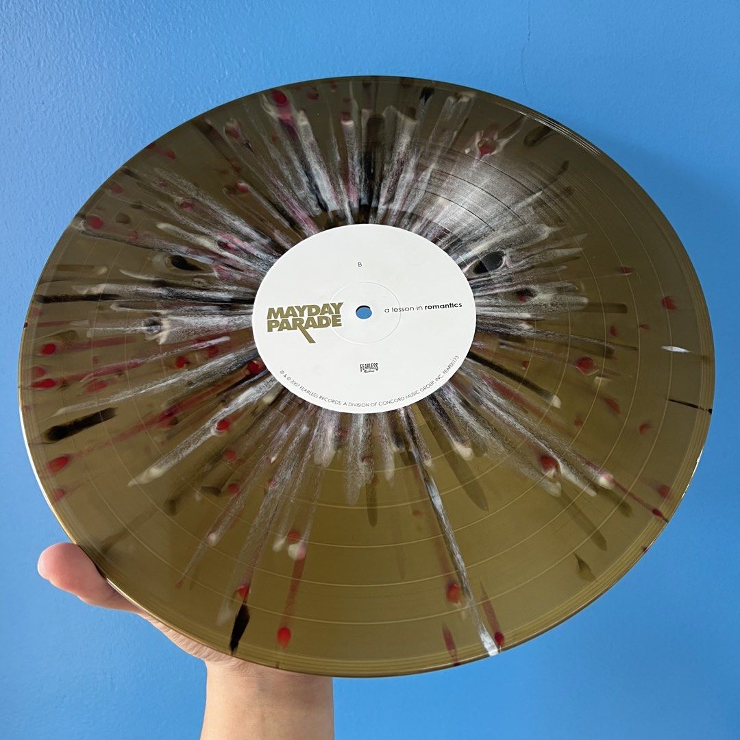 Mayday Parade - A Lesson in Romantics Vinyl Record (Category: Vinyls) located in Dumaguete. Submitted by spin_drs2.0 (Listing ID 1437732302, Image 3). Description: 10th Anniversary Edition Gold w/ red, black, and white splatter LP Buy both Mayday Parade records for PHP 5500 Selling from my personal collection; records are loved and cared for from day 1. Records come with new inner and outer sleeves. Shipping from Dumaguete City with fees shoulder