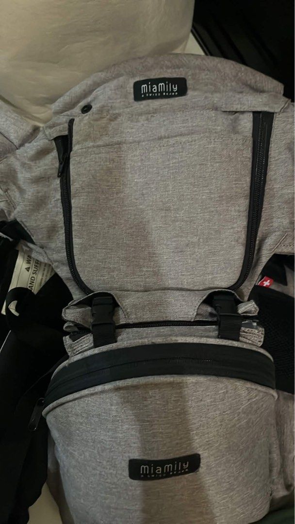 Miamily Baby Carrier (Category: Carriers & Slings) located in Batangas. Submitted by prinsesita14 (Listing ID 1442173672, Image 1). Description: - Grey Miamily Baby Carrier - Convenient storage zippers - Secure buckle system for a safe fit - Designed for baby and parent comfort - Easily adjustable straps - Ideal for parents needing a hands-free solution while on the move.