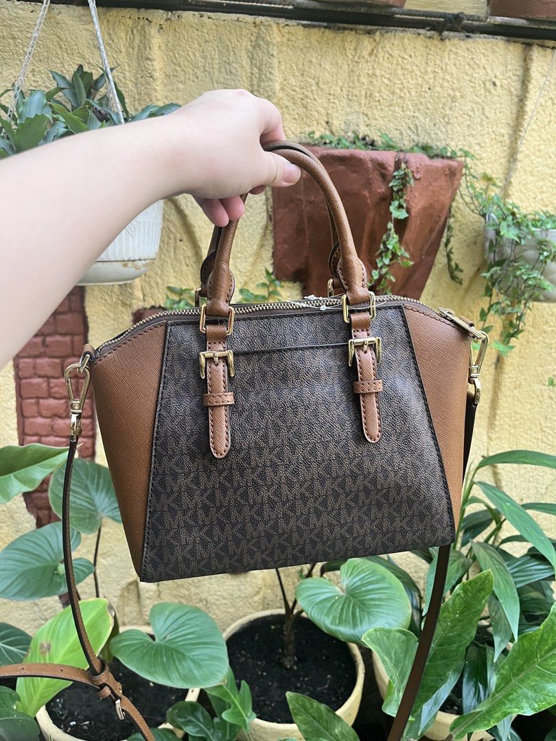 Michael Kors Satchel Bag (Category: Luxury Bags & Wallets) located in Cavite. Submitted by gastuseraph (Listing ID 1442258301, Image 2). Description: Authentic. Message me if you want to see more photos/videos of the bag!.