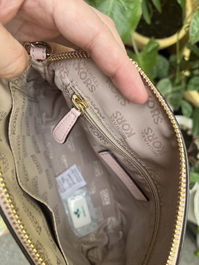 Michael Kors Satchel Bag (Category: Luxury Bags & Wallets) located in Cavite. Submitted by gastuseraph (Listing ID 1442258301, Image 3). Description: Authentic. Message me if you want to see more photos/videos of the bag!.