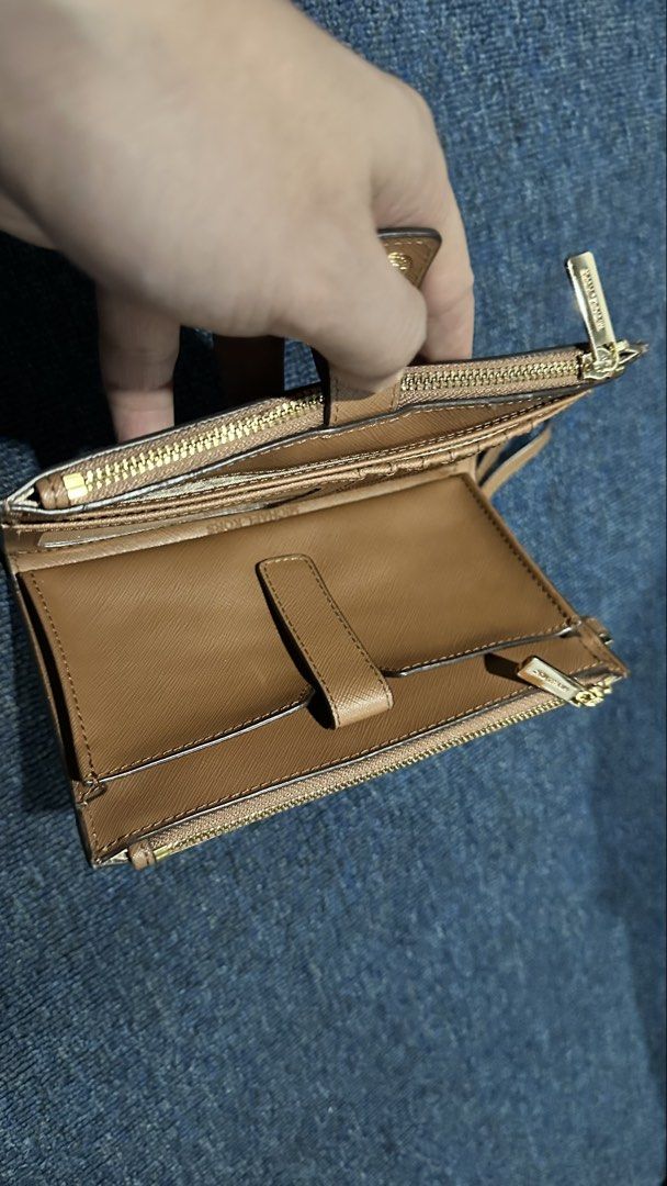 MK (Category: Wallets & Card holders) located in Quezon City. Submitted by christopherkirk (Listing ID 1442218563, Image 3). Description: Brown MK wallet Brand new .