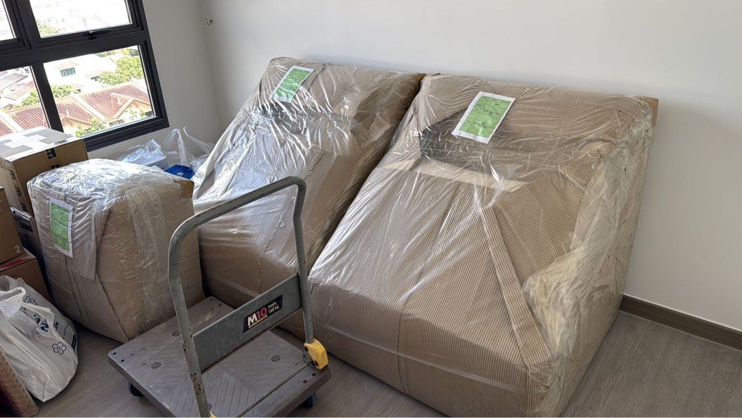 Modular Sofa (Category: Sofas) located in Singapore. Submitted by crystal_yap (Listing ID 1442239609, Image 3). Description: - Comfortable modular sofa - Textured boucle fabric upholstery - Neutral beige and cream color palette - Ideal for living rooms or lounge areas - Ready for immediate pickup.