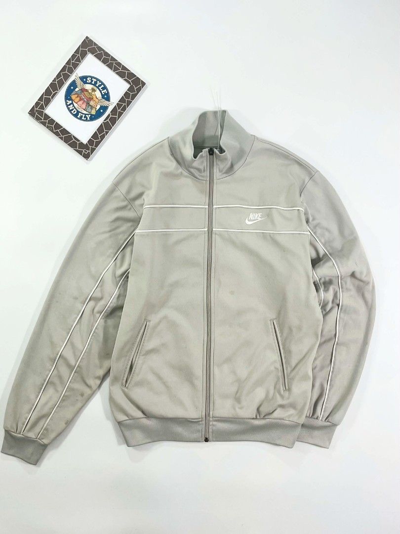 Nike track jacket vintage cream (Category: Sets & Coordinates) located in Manila. Submitted by styleandfly191238 (Listing ID 1442178904, Image 1). Description: Dimes Length 27 Width 23.5 Issue none med to large Color rate 10/10 Condition excellent Complete tags and original Fav piece Good fittings Color may vary due to lighting Unli vc and vouch to assure your assurance Dm me for more inquiry.