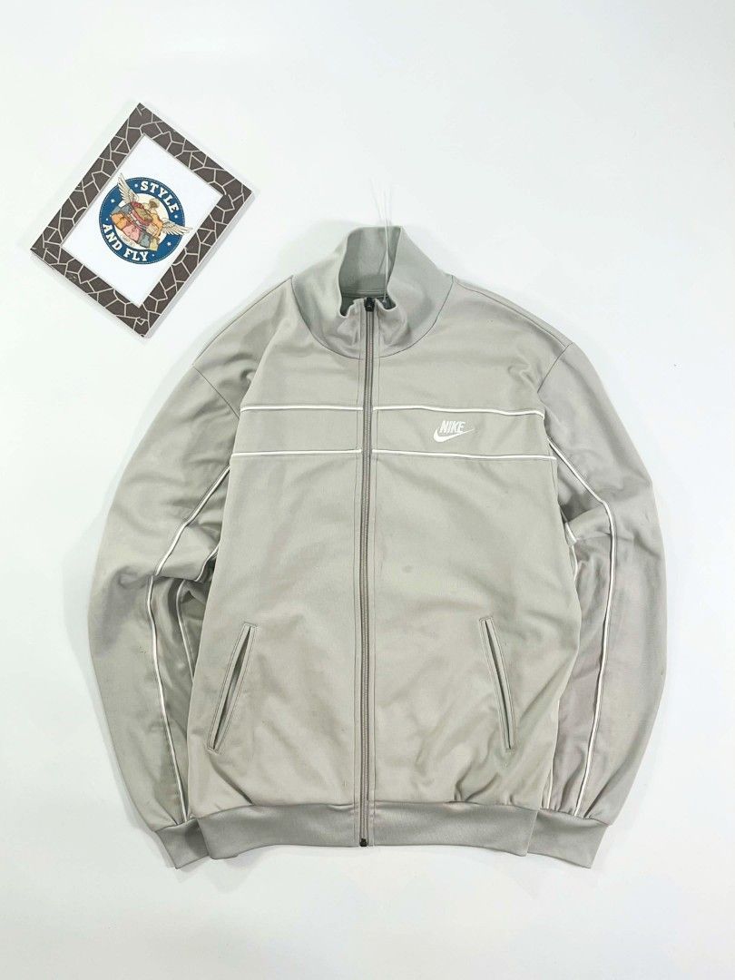 Nike track jacket vintage cream (Category: Sets & Coordinates) located in Manila. Submitted by styleandfly191238 (Listing ID 1442178904, Image 2). Description: Dimes Length 27 Width 23.5 Issue none med to large Color rate 10/10 Condition excellent Complete tags and original Fav piece Good fittings Color may vary due to lighting Unli vc and vouch to assure your assurance Dm me for more inquiry.
