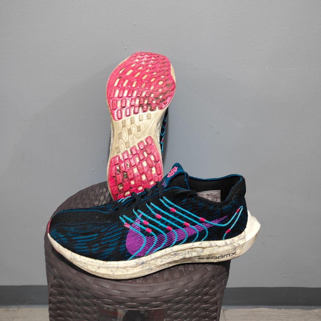 Nike ZoomX Running Shoes US 10 (Category: Sneakers) located in Quezon City. Submitted by iamfreduu (Listing ID 1442209413, Image 3). Description: - Nike ZoomX running shoes - Color: Black with blue and pink accents - Size: US 10 / UK 9 / EUR 44 - Origin: Made in Vietnam - Condition: Great for runs - Reason for selling: Friend clearing space.