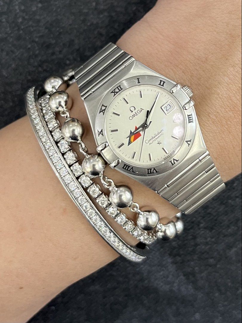 Omega Constellation Automatic Watch x PAL (Category: Luxury Watches) located in Makati City. Submitted by the_ambitious_peasant (Listing ID 1442310793, Image 1). Description: - Omega Constellation Automatic Watch x PAL - Elegant Cream Dial with Roman Numerals - Convenient Date Window at 3 o'clock - Durable Stainless Steel Bracelet - 30mm - Watch, Inner and Outer Box; Booklets; Guarantee; White Tag; Extra Link.