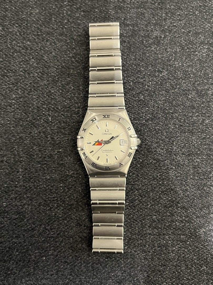 Omega Constellation Automatic Watch x PAL (Category: Luxury Watches) located in Makati City. Submitted by the_ambitious_peasant (Listing ID 1442310793, Image 2). Description: - Omega Constellation Automatic Watch x PAL - Elegant Cream Dial with Roman Numerals - Convenient Date Window at 3 o'clock - Durable Stainless Steel Bracelet - 30mm - Watch, Inner and Outer Box; Booklets; Guarantee; White Tag; Extra Link.