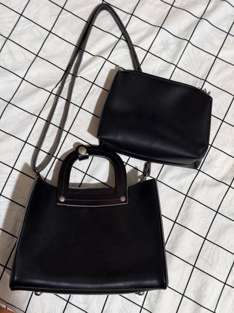 Parisian Black Handbag with Matching Pouch (Category: Cross-body Bags) located in Tuguegarao City. Submitted by tresss (Listing ID 1442331401, Image 1). Description: - Set of two black bag - Very sturdy - Structured top-handle handbag with main compartment and inner zippered pouch - Smaller crossbody pouch with a long strap - Ideal for organizing your daily essentials.