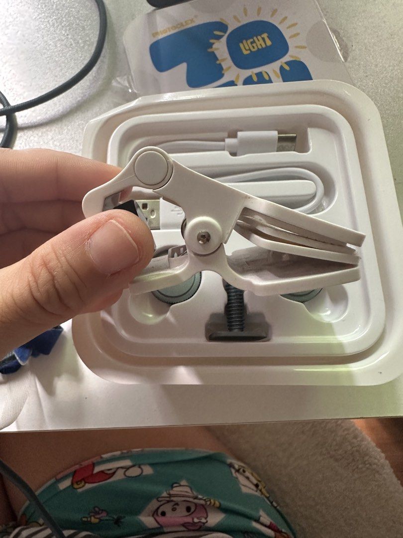 Photoolex Tofu Light w/ clip + silicone diffuser (Category: Lighting & Studio Equipment) located in Quezon City. Submitted by honeyhon3y (Listing ID 1442229878, Image 3). Description: - Godox ML60 LED Light - Ideal for Photography & Videography - Compact and Portable Design - Includes USB-C Charging Cable - Comes with Mounting Bracket - Includes Diffuser - All Original Packaging and Accessories Included - Ready to Use.