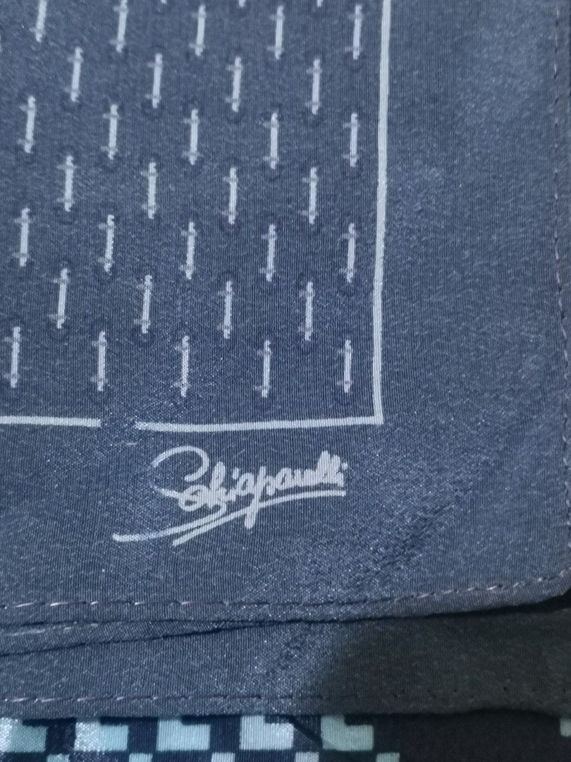 Pierre Cardin & Schiaparelli Pocket Squares Set (Category: Sets or Coordinates) located in San Pablo. Submitted by somariaj (Listing ID 1442269292, Image 2). Description: - Two designer pocket squares - Color: Dark Blue - Brand 1: Pierre Cardin (geometric pattern) - Brand 2: Schiaparelli (small pattern) - Adds a touch of class to any outfit Pierre Cardin 14x15 Schiaparelli 13x13.