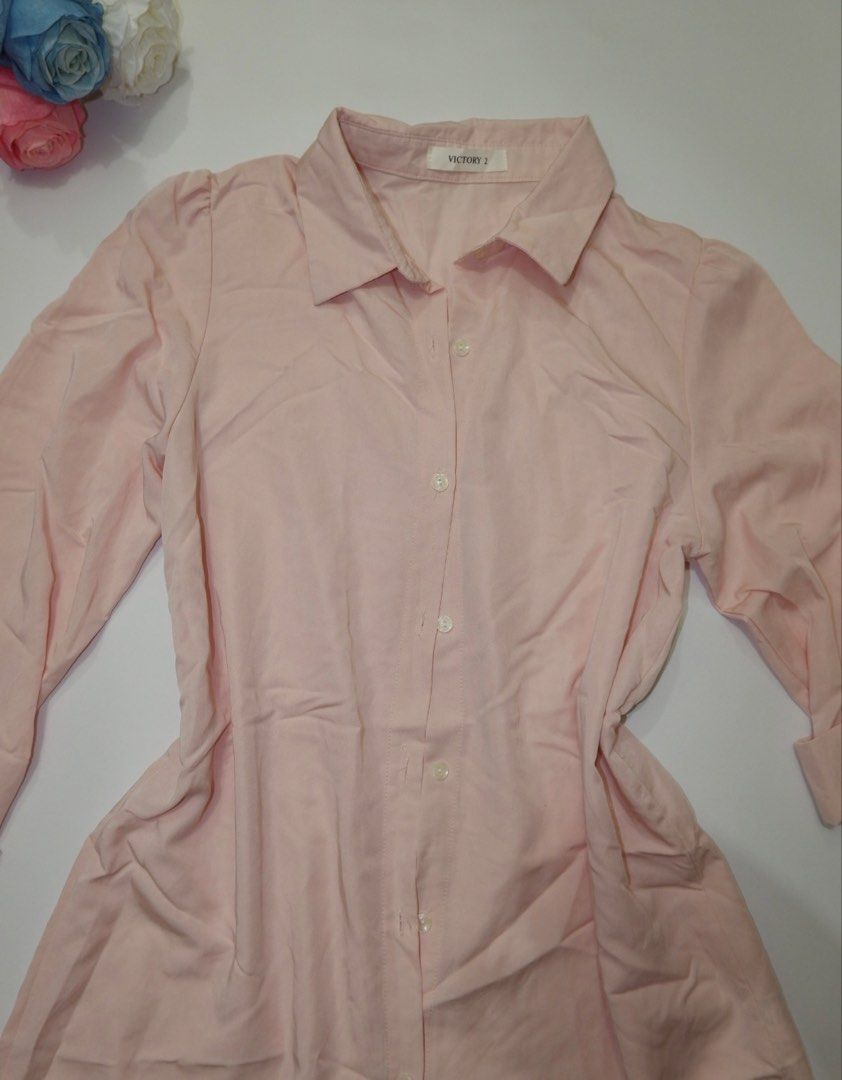Pink Button-Up Shirt Dress (Category: Dresses) located in Pasig City. Submitted by mjca29 (Listing ID 1442232350, Image 2). Description: - Pink longsleeve dress - Fabric has a slight texture. Size: Medium. - Perfect for casual wear *Manage your expectation. Pre-loved item *Color may vary due to lighting SF will shouldered by buyer.