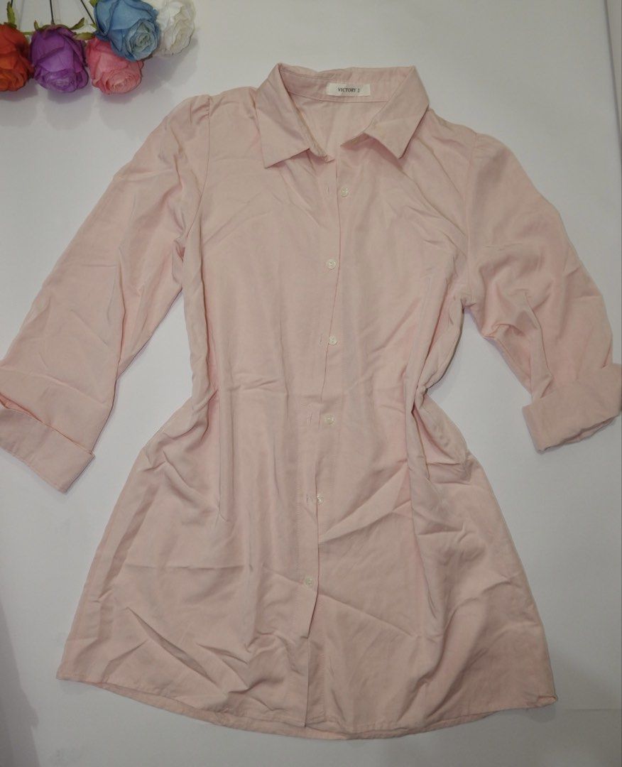 Pink Button-Up Shirt Dress (Category: Dresses) located in Pasig City. Submitted by mjca29 (Listing ID 1442232350, Image 1). Description: - Pink longsleeve dress - Fabric has a slight texture. Size: Medium. - Perfect for casual wear *Manage your expectation. Pre-loved item *Color may vary due to lighting SF will shouldered by buyer.