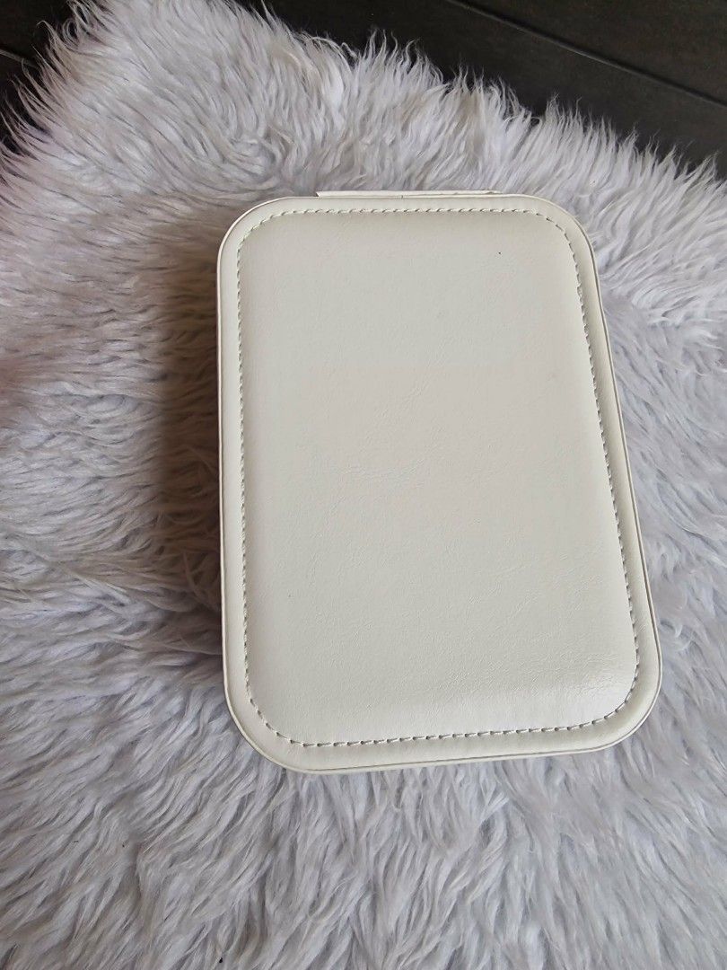 Portable Vanity Kit Mirror (White) (Category: Makeup) located in Quezon City. Submitted by floreskari78555 (Listing ID 1442272816, Image 3). Description: Portable Vanity Kit Mirror (White) Pu leather (smooth)✅ LED Ring Light✅ Encircles the mirror to provide shadow-free, even facial illumination. Smart Touch Dimmer✅Central touch button controls the light power and adjustable brightness. Storage Compartments✅ Divided lower tray neatly separates jew