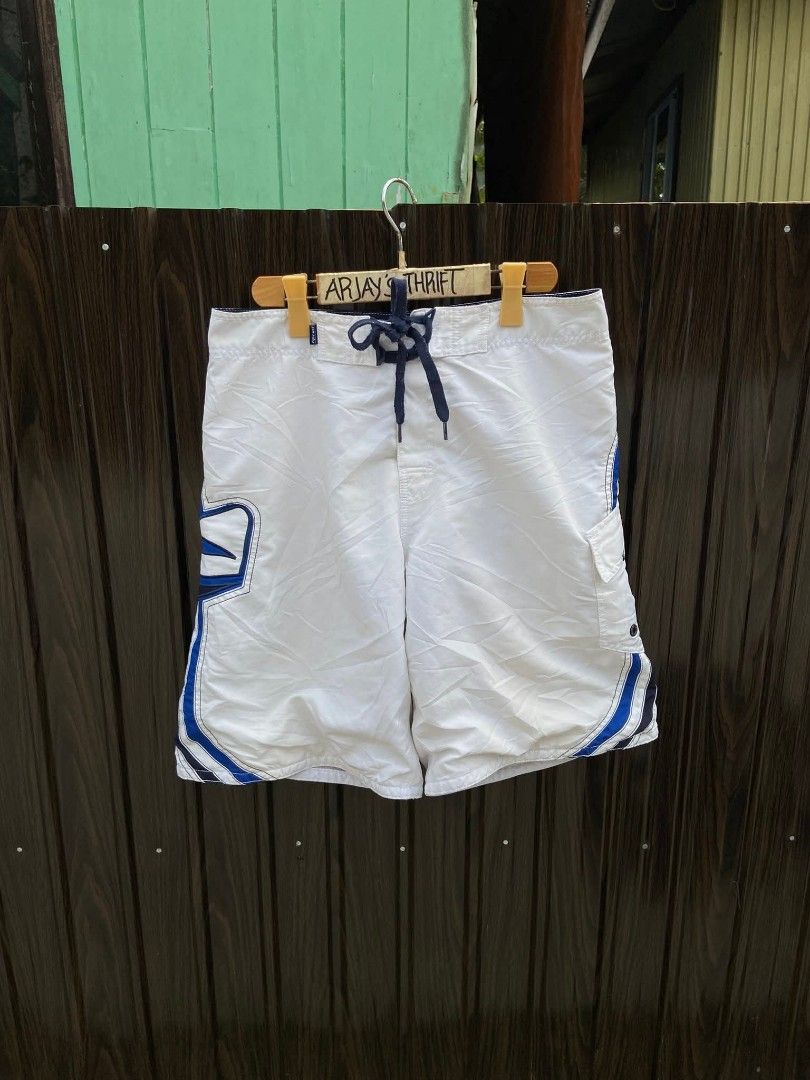 Rip Curl White Blue Striped Board Shorts (Category: Swim Trunks & Board Shorts) located in Manila. Submitted by thebrothrift (Listing ID 1442302272, Image 1). Description: - White Rip Curl board shorts - Blue and black stripe design - Elastic waistband with drawstring - Velcro pocket on the back - Ideal for swimming or lounging VINTAGE RUPCURL BOARD SHORTS🥶 WAISTLINE:32-33 LENGTH:19 EXCELLENT CONDITION NO ISSUE❌ NEED WASH 2500💵.