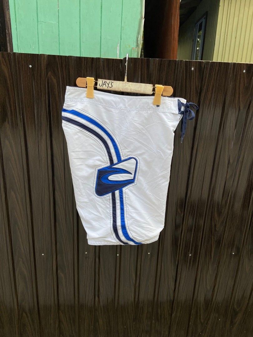 Rip Curl White Blue Striped Board Shorts (Category: Swim Trunks & Board Shorts) located in Manila. Submitted by thebrothrift (Listing ID 1442302272, Image 3). Description: - White Rip Curl board shorts - Blue and black stripe design - Elastic waistband with drawstring - Velcro pocket on the back - Ideal for swimming or lounging VINTAGE RUPCURL BOARD SHORTS🥶 WAISTLINE:32-33 LENGTH:19 EXCELLENT CONDITION NO ISSUE❌ NEED WASH 2500💵.