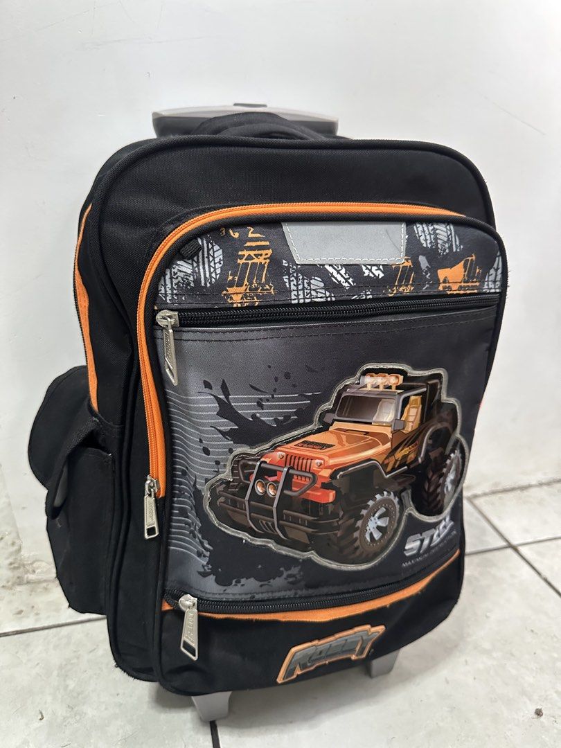 Robby Rabbit Steering Wheel Trolley 16-Inch (Category: Strollers) located in Lipa City. Submitted by lei.li (Listing ID 1442277541, Image 1). Description: Size: 31 L X 16 W X 41H cm Capacity: 20 L Fabric with water repellent coatings (2) Wheels at the back made from 100% virgin plastic materials (not recycled) which are more durable Trolley Handle connected to 100% High Grade Aluminum tubes from top to bottom for rust prevention Bottom Pull out F