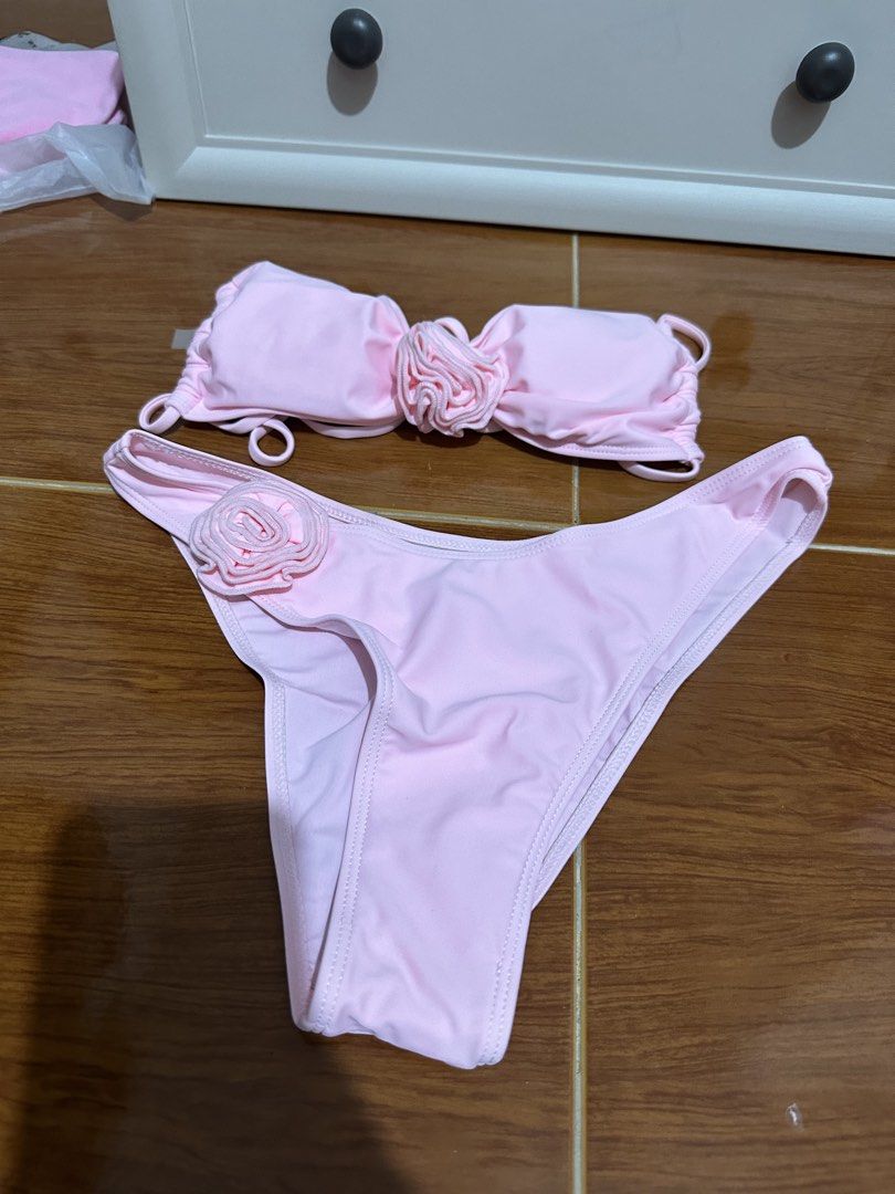 Shein Pink 3D Floral Spaghetti Strap Bikini (Category: Bikinis & Swimsuits) located in Manila. Submitted by rubiozoila96134 (Listing ID 1442291175, Image 2). Description: - Adorable pink bikini set - Ruched bandeau top with central floral accent - High-cut bottoms with side floral detail - Adjustable spaghetti straps for a custom fit - Perfect for beach trips and pool parties.