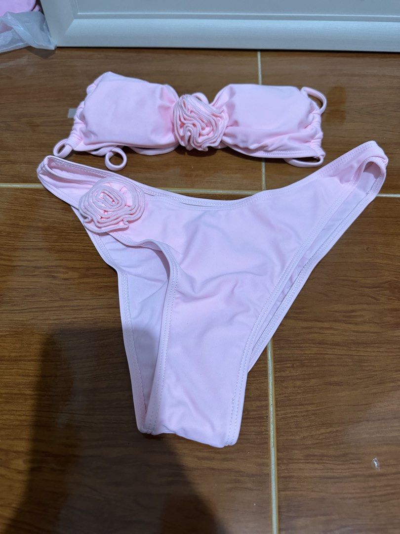 Shein Pink 3D Floral Spaghetti Strap Bikini (Category: Bikinis & Swimsuits) located in Manila. Submitted by rubiozoila96134 (Listing ID 1442291175, Image 3). Description: - Adorable pink bikini set - Ruched bandeau top with central floral accent - High-cut bottoms with side floral detail - Adjustable spaghetti straps for a custom fit - Perfect for beach trips and pool parties.