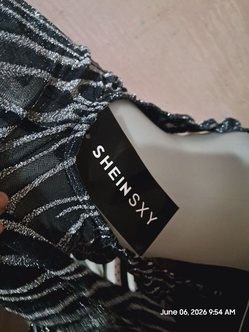 SHEINXSXY Black Sheer Top with Silver Stripes (Category: Blouses) located in Caloocan City. Submitted by missrshop (Listing ID 1442273681, Image 3). Description: - SHEINXSXY sheer black top - Features silver wavy stripes - Long sleeves - Ideal for layering or a night out.