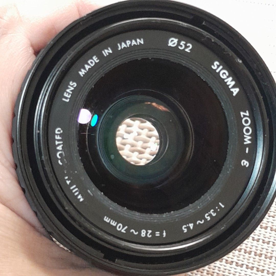 Sigma Zoom 28-70mm for FD Mount (Category: Lens & Kits) located in Las Pinas. Submitted by 84vintage (Listing ID 1442181136, Image 3). Description: For those requesting cheap Vintage lenses with character.... If you're tired of getting boring, clinical sharp results from your new generation lenses.... Canon FD mount vintage Sigma 28-70 for those vintage vibe movies. Fair condition with minor dust and minimal fungus. Make movies with a different l