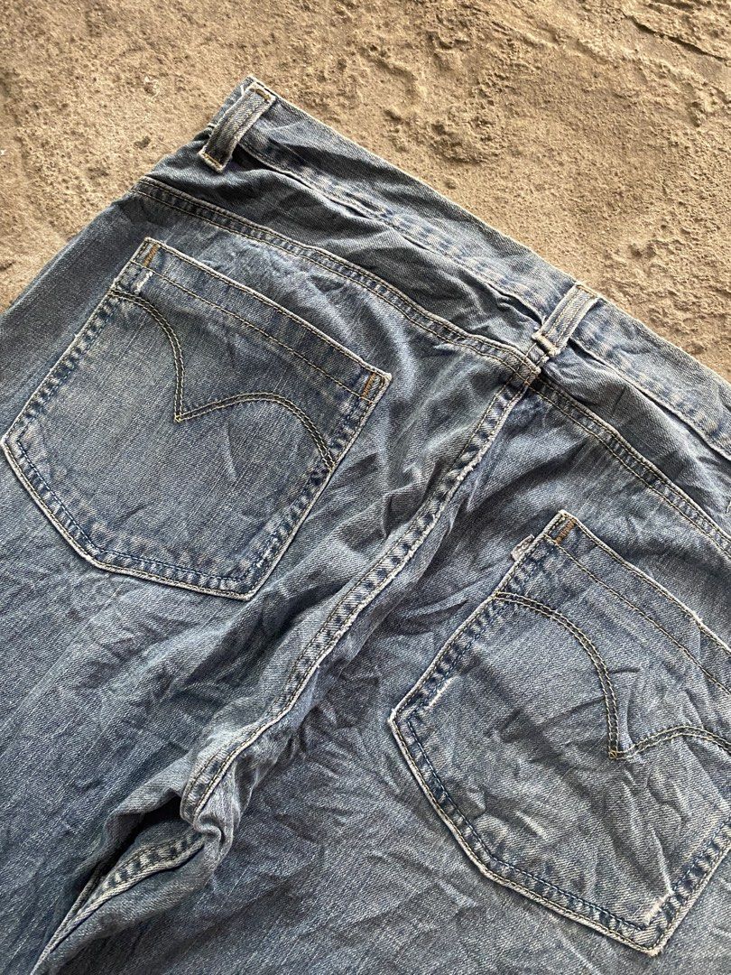 Silver Tab Levi's Wide Leg Jeans (Category: Jeans) located in Caloocan City. Submitted by remythrift (Listing ID 1442222200, Image 2). Description: - Classic blue denim jeans - Wide leg cut for a relaxed fit - Trendy distressed hem detail - Secure button and zip closure - Two back pockets with signature stitching - Versatile staple piece for any casual outfit.