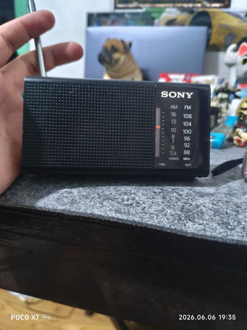 Sony & Panasonic Portable AM/FM Radios (Category: Portable Music Players) located in Baguio. Submitted by baguiobeans (Listing ID 1442275990, Image 3). Description: - Two portable radios: 1 black Sony, 1 silver Panasonic. - Both feature AM/FM bands. - Extendable antennas for clear reception. - Ideal for travel, outdoor activities, or workshop use. - Both tested and in good working condition. - Batteries are not included..