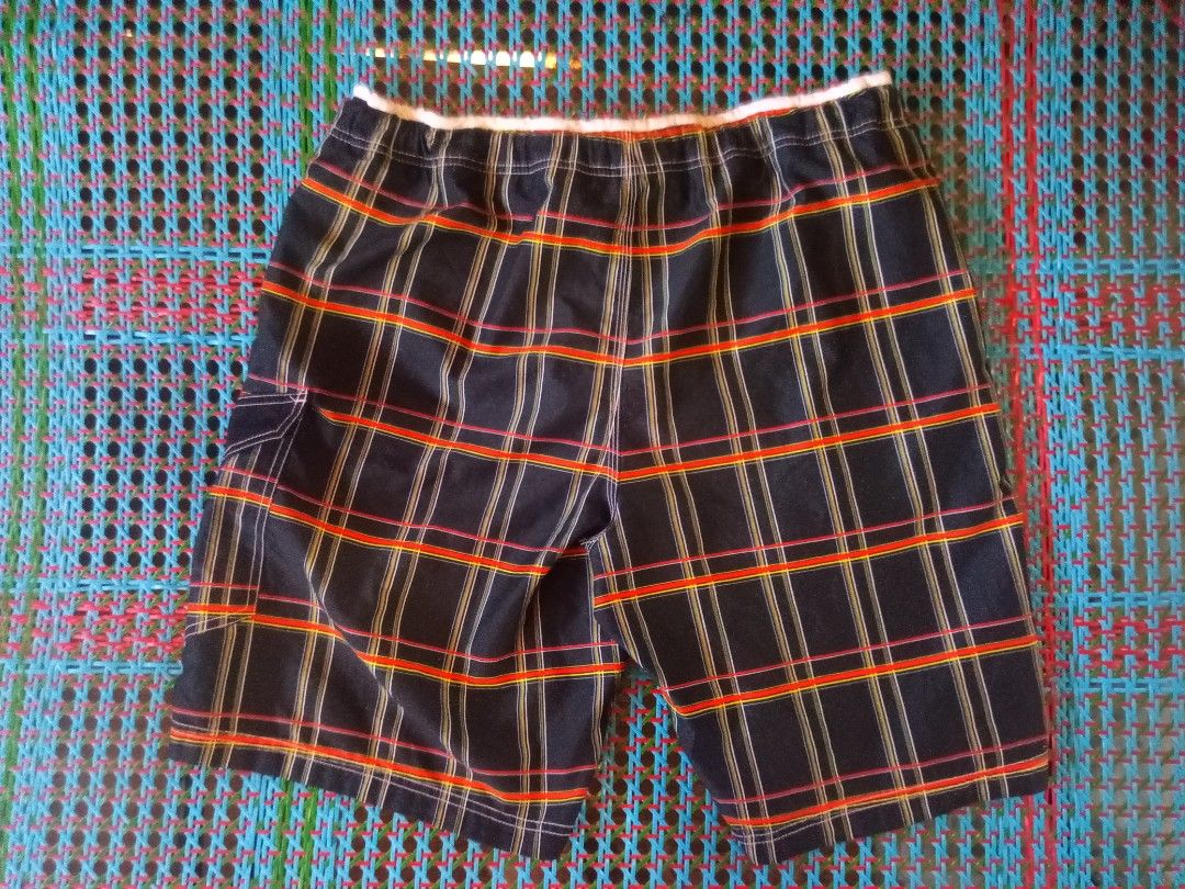 Speedo Plaid Swim Trunks Shorts (Category: Swim Trunks & Board Shorts) located in Manila. Submitted by boot_tdm (Listing ID 1442209692, Image 2). Description: - Brand: Speedo - Style: Plaid swim trunks - Features: Drawstring waist, back pocket with velcro closure - Detail: Red trim along bottom hem - Ideal for: Swimming and lounging - Condition: Please check photos for details.