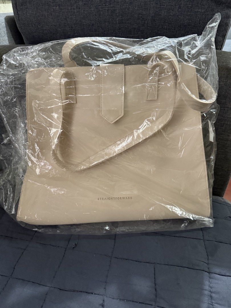 Straightforward Boundless Basics Tote Bag - DVL Kiyoto Sand (Category: Tote Bags) located in Quezon City. Submitted by junieveeee (Listing ID 1442167900, Image 1). Description: - Sand tote bag Boundless Basics from Straightforward - Simple and clean design - Magnetic snap closure - Internal pocket - Straps still wrapped in plastic (never used) - Ideal for everyday use or work.