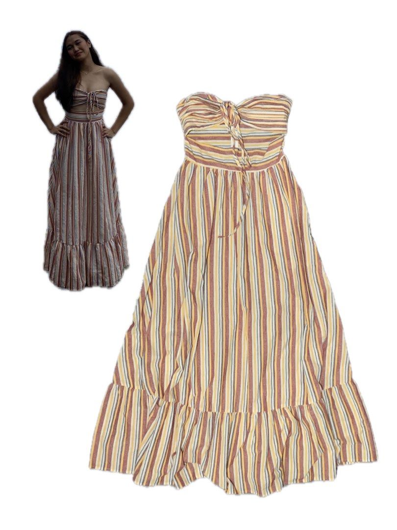 Strapless Striped Maxi Dress with Tie Front (Category: Dresses) located in Rizal. Submitted by pcesspscl145 (Listing ID 1442298630, Image 2). Description: - Strapless maxi dress - Fun vertical stripe pattern (yellow, brown, blue) - Tie detail at the bust - Ruffled hem - Drawstring waist for adjustable fit - Ideal for beach vacations and summer outings.