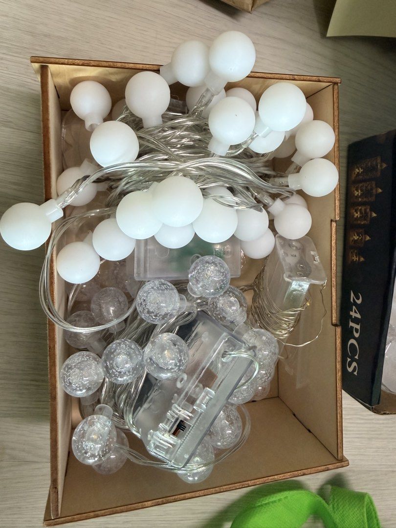 String Lights (Category: Wall Decor) located in Singapore. Submitted by ninilove8 (Listing ID 1442287213, Image 1). Description: - Battery operated crystal & clear bubble string lights - 6metre long, each string 40 bulbs - Ideal for parties, rooms, and outdoor decoration - Creates a cozy and warm ambiance - Lights are on a thin, flexible wire.