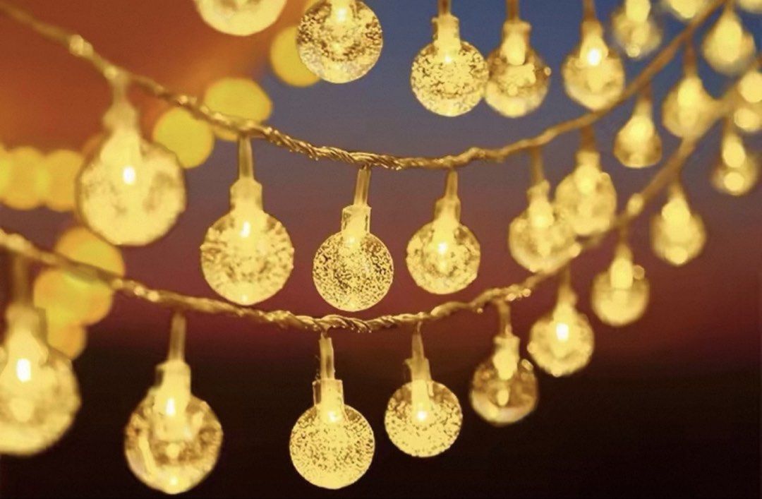 String Lights (Category: Wall Decor) located in Singapore. Submitted by ninilove8 (Listing ID 1442287213, Image 2). Description: - Battery operated crystal & clear bubble string lights - 6metre long, each string 40 bulbs - Ideal for parties, rooms, and outdoor decoration - Creates a cozy and warm ambiance - Lights are on a thin, flexible wire.