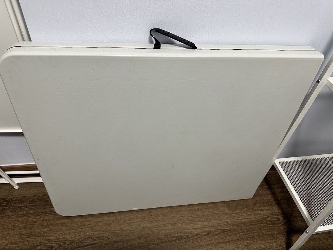 Table (Category: Tables & Sets) located in Singapore. Submitted by homeuse2 (Listing ID 1442269131, Image 2). Description: Foldable Portable Table Dimension: Width: 75cm+/- Length: 180cm+/-(Open) Length: 90cm+/-(Folded).