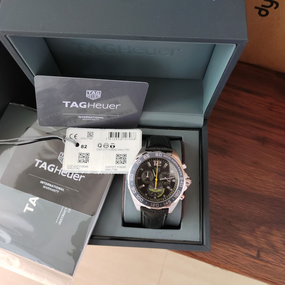 TAG Heuer Watch with Box and Papers (Category: Luxury Watches) located in Aglipay. Submitted by rowannnn (Listing ID 1442244460, Image 1). Description: - Authentic TAG Heuer watch - Includes original box, international warranty card, and instruction manual - Black leather strap - Black dial with silver accents - Chronograph function - Ready for a new owner.