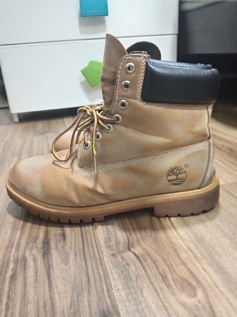 Timberland Classic 6-Inch Premium Waterproof Boots (Category: Boots) located in Manila. Submitted by rancevilla59266 (Listing ID 1442339909, Image 2). Description: - Classic tan Timberland boots - Waterproof nubuck leather - Lace-up front with metal eyelets - Padded collar for comfort - Durable rubber lug outsole for traction - Great for outdoor adventures or everyday wear - Shows some signs of wear, but still has lots of life left.