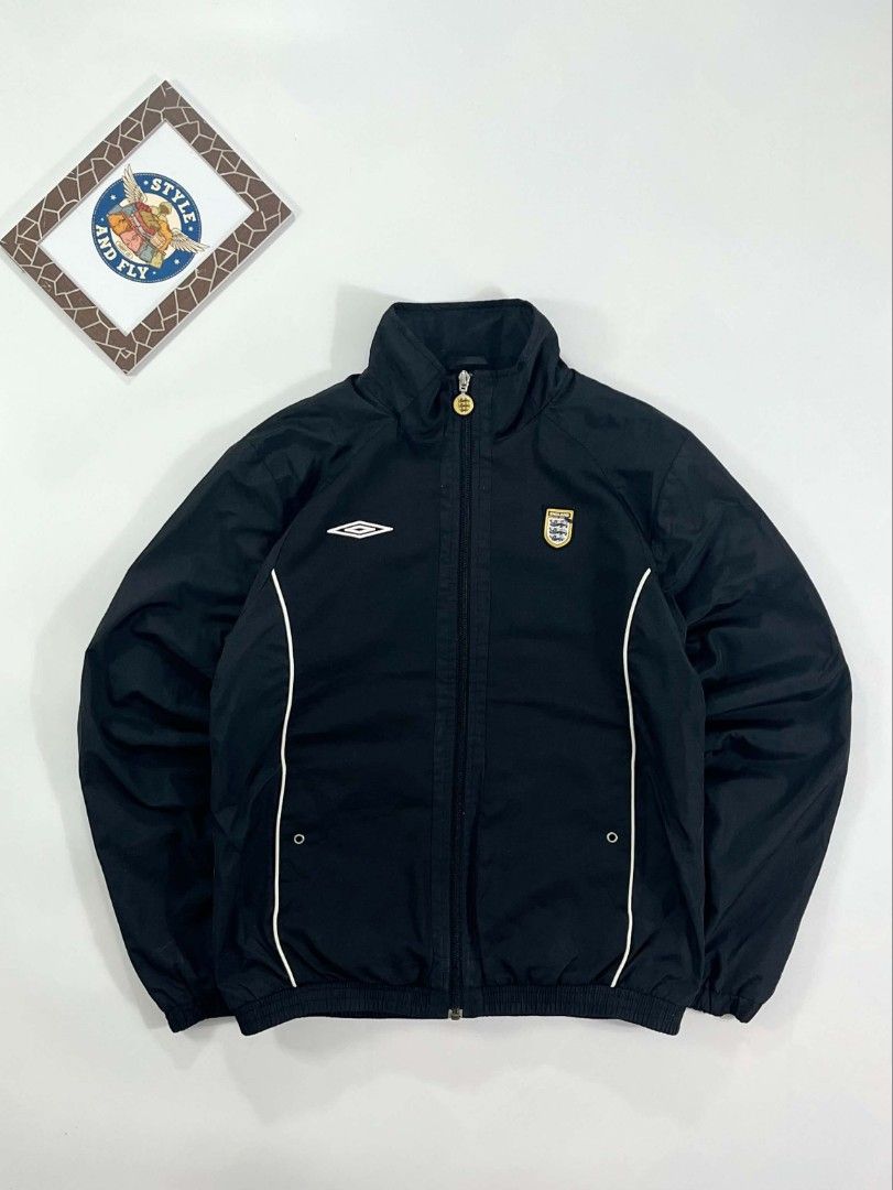Umbro england track Jacket (Category: Sets & Coordinates) located in Manila. Submitted by styleandfly191238 (Listing ID 1442176915, Image 1). Description: Dimes Length 26 Width 21.5 Issue none med to large med to large Color rate 10/10 Condition excellent Complete tags and original Fav piece Good fittings Color may vary due to lighting Unli vc and vouch to assure your assurance Dm me for more inquiry.