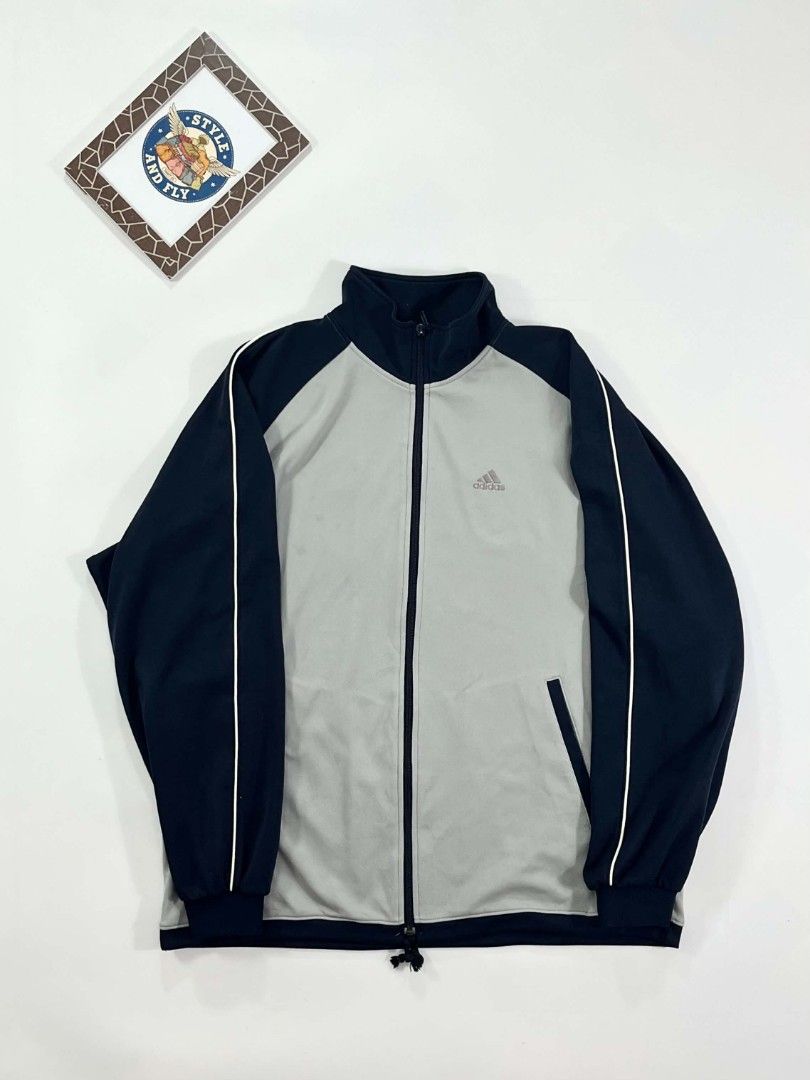 Vintage adidas track jacket (Category: Sets & Coordinates) located in Manila. Submitted by styleandfly191238 (Listing ID 1442178352, Image 1). Description: Dimes Length 27 Width 22.5 Issue none large to xl med to large Color rate 10/10 Condition excellent Complete tags and original Fav piece Good fittings Color may vary due to lighting Unli vc and vouch to assure your assurance Dm me for more inquiry.